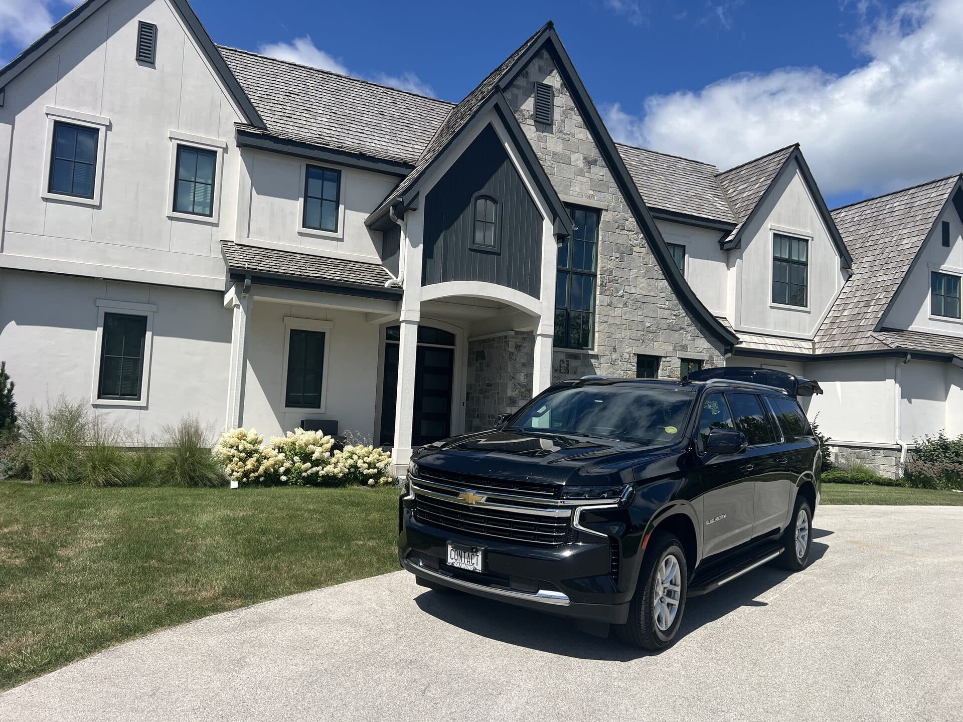 Contact Limo SUV at Mequon Wisconsin luxury home hourly limo service ready to depart