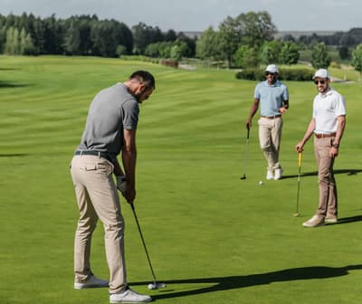 Golfers on the course during a Lake Geneva golf day
